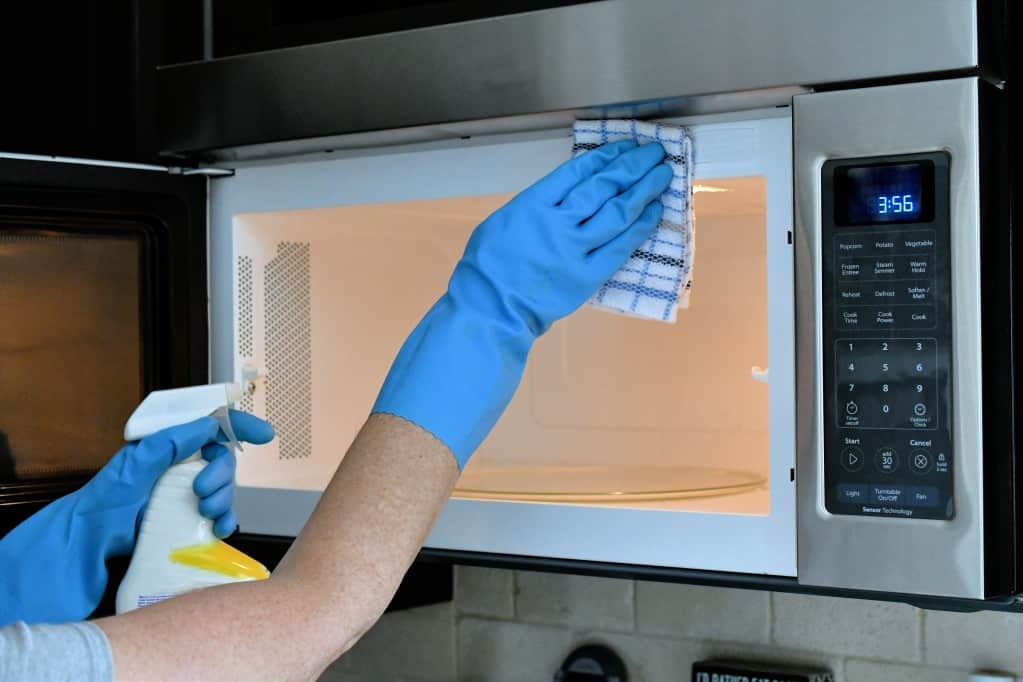 How to Clean Grease Off a Microwave Over a Stove